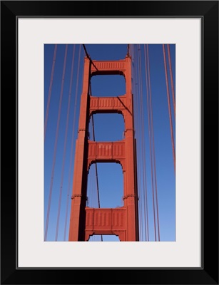 Golden Gate Bridge Tower against blue sky
