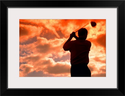golf player in the sunset