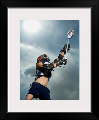Low angle view of lacrosse player