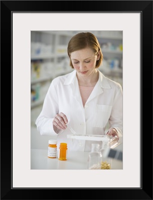 Pharmacist preparing medicine