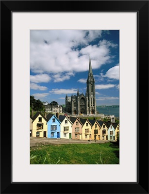 St. Coleman's Cathedral Of Cobh Behind Colorful Row Houses
