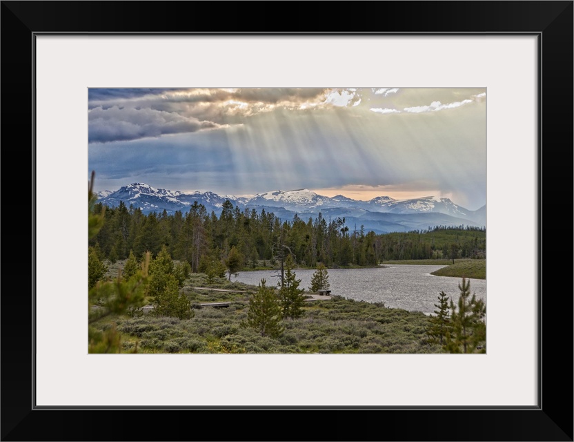 Sun rays filtering through clouds.