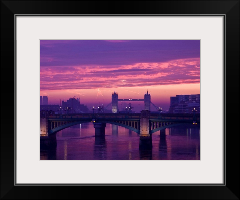 Sunrise over the Thames and Tower Bridge in London.