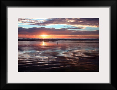 USA, California, Morro Strand State Beach, Sunset over the ocean