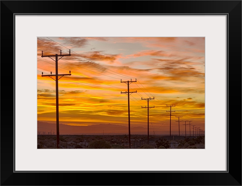 USA, California, Palm Springs, power line at sunrise