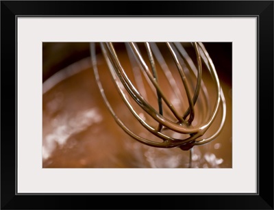 Whisking chocolate in a saucepan