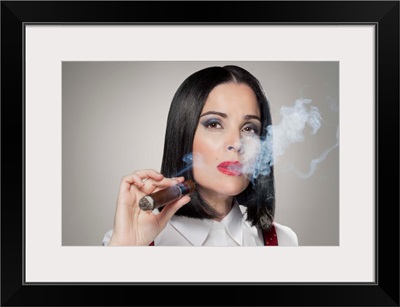 Woman smoking a cigar, portrait