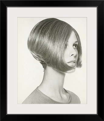 Young woman with bob hairstyle, close-up, studio shot
