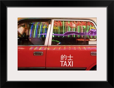 China, Hong Kong, nightlife neon reflected in a Hong Kong taxi window