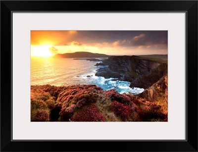 Europe, Ireland, Portmagee cliffs at sunset along the Ring of Kerry