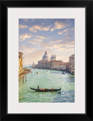 Gondola With Tourists With The Island Of San Giorgio Maggiore, Venice, Italy