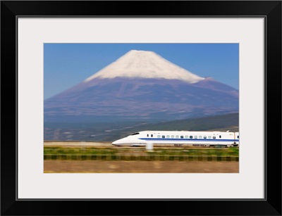 Japan, Honshu, Shinkansen (Bullet train) passing Mount Fuji