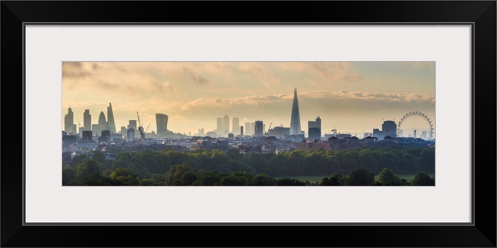 London skyline with the Shard above Hyde Park, London, England, UK