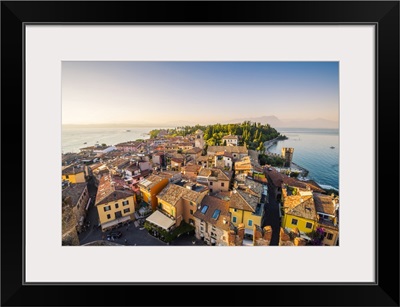 Sirmione, lake Garda, Lombardy, Italy. High angle view of the old town at sunset