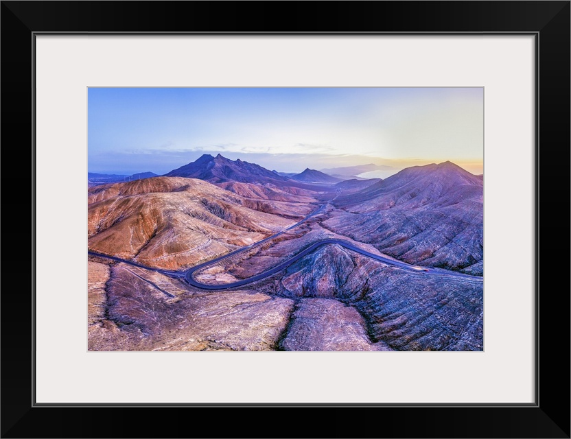 Spain, Canary Islands, Fuerteventura, mountain road crossing the volcanic landscape near Sicasumbre astronomical viewpoint