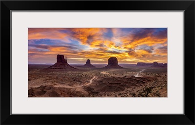 The Mittens Against Colourful Cloudy Sky At Sunrise, Monument Valley, Arizona