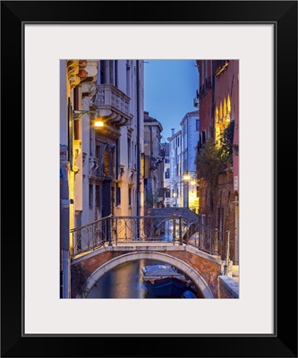 Venice, Veneto, Italy, View over a bridge and a canal at dusk