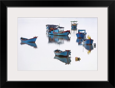 Vietnam, Cam Ranh, Traditional Fishing Boats Reflected In Calm Water