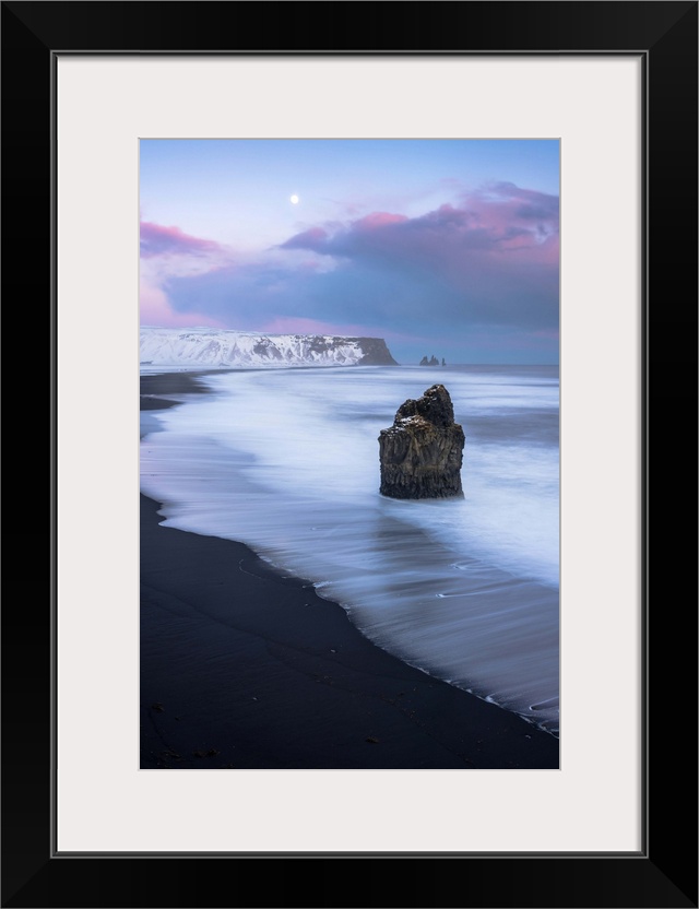 Vik, Southern Iceland, Europe. The black beach of Reynisfjara on a winter sunset.