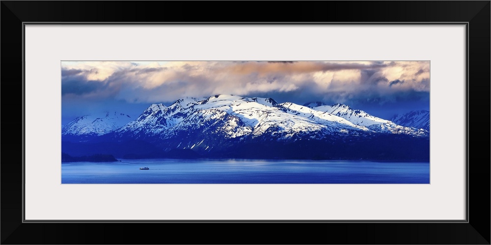 A Panoramic of A Lone Fishing Boat Pulls Into Homer Bay at Sunrise; Homer, Alaska