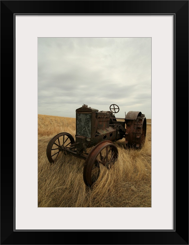 Rusty Tractor In Field