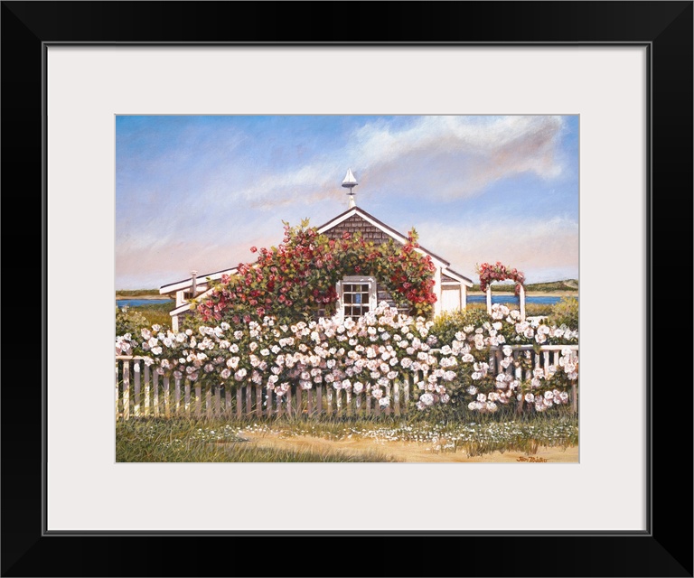 Waterfront house with roses and fence