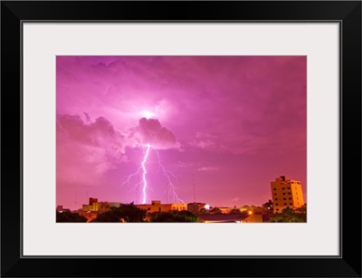 A lightning bolt striking down in the city of Asuncion, Paraguay