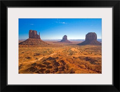 Monument Valley and the Three Mittens rock formations on a clear day