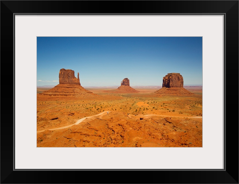 The rock formation called Mittens, and desert landscape.