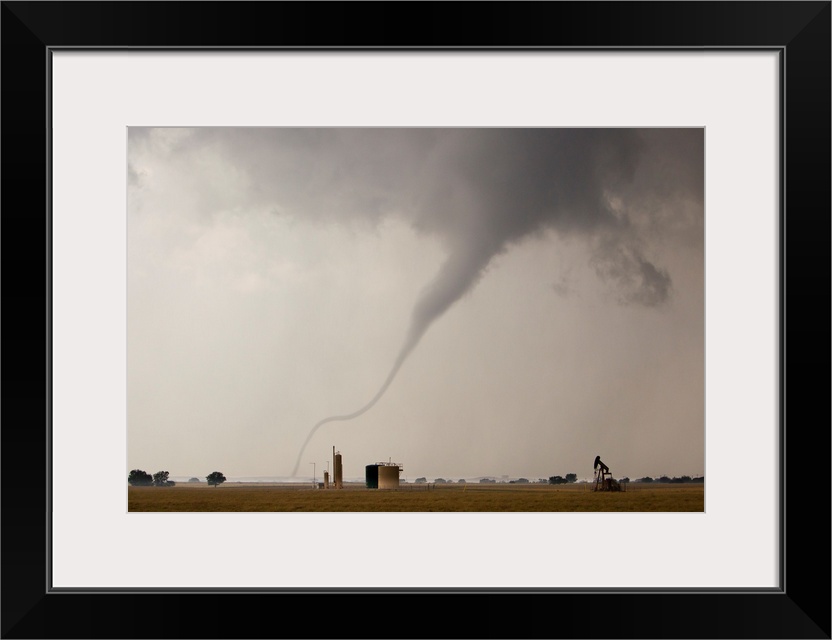 Thin rope tornado, one of the first in a long series in a major outbreak.