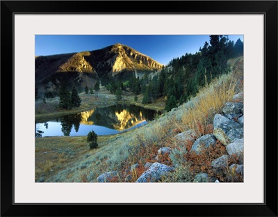 Bunsen Peak reflected in lake, near Mammoth, Yellowstone National Park, Wyoming