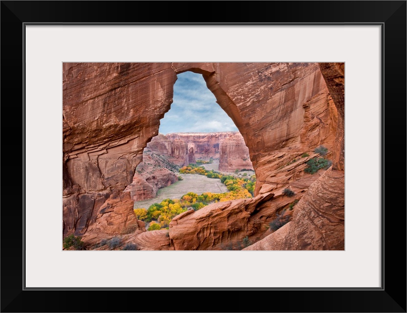 Natural arch with river valley in the background, Arizona