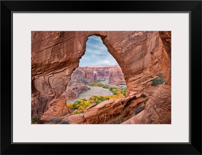 Natural arch with river valley in the background, Arizona