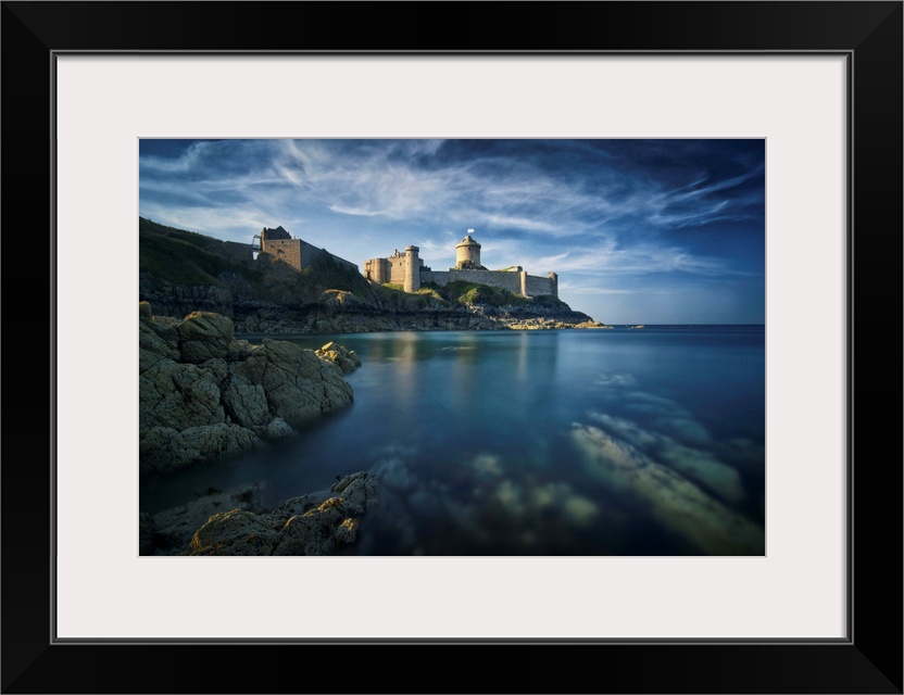 Classical view of a castle facing the sea and the rock, the place of Fort la Latte, in Brittany in France.