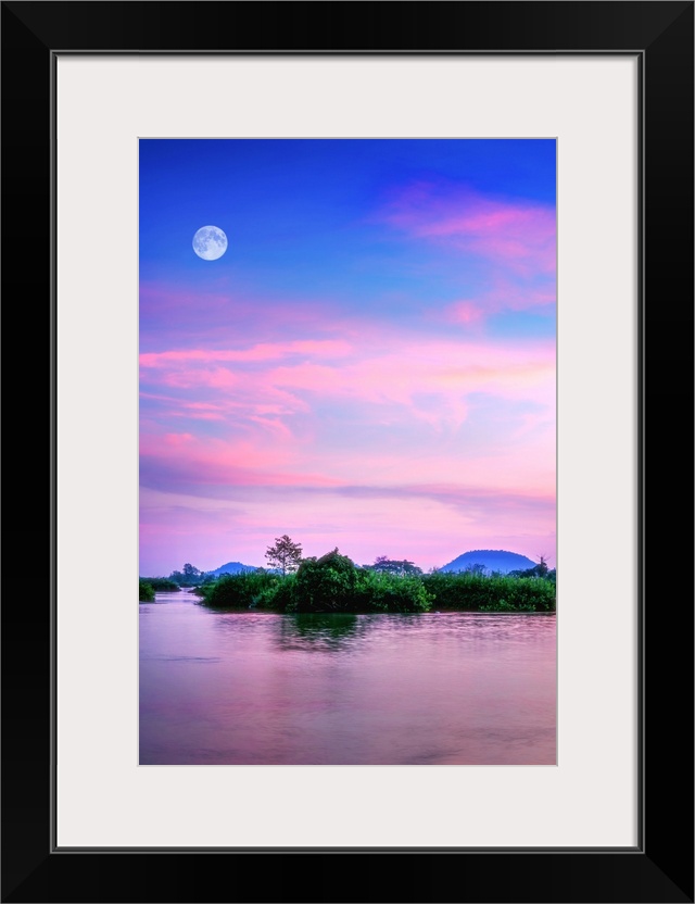 Islands on the Mekong with the moon above the landscape
