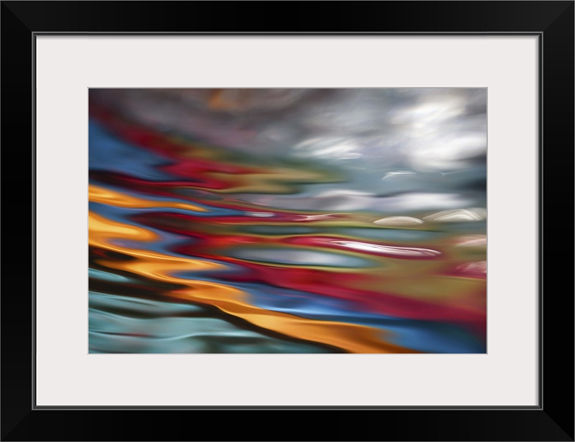 An abstract photograph of vibrant colors in a wave-like formation.