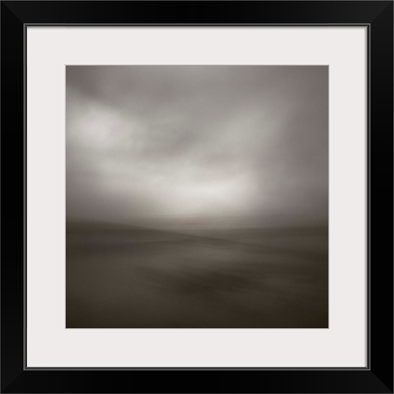 A minimal contemporary zen-like monochrome black and white sepia toned dreamy soft focus seascape.