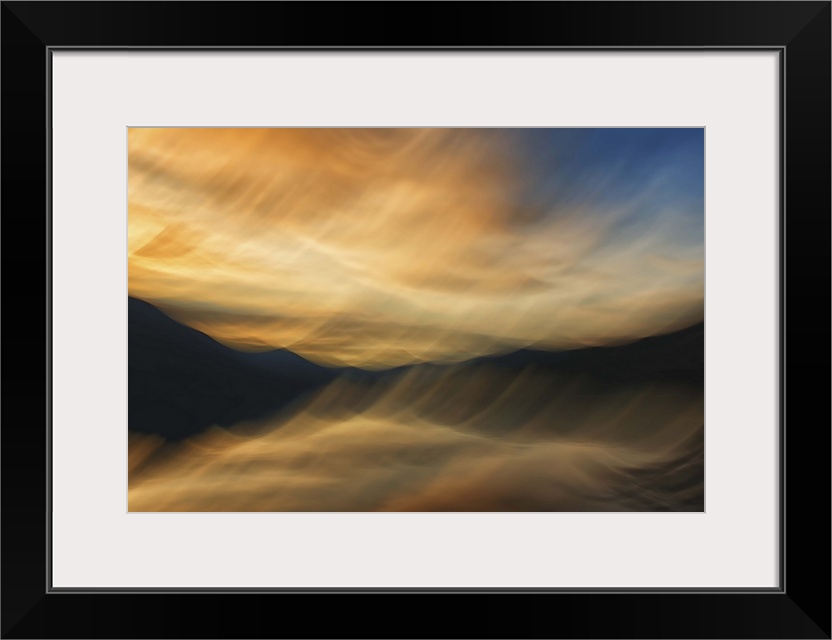 Abstract photograph of blurred and blended colors and flowing lines representing Slocan Lake in British Columbia, Canada.
