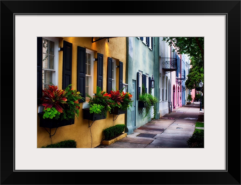 Fine art photo of a shaded alley with colorful buildings in Charles, South Carolina.