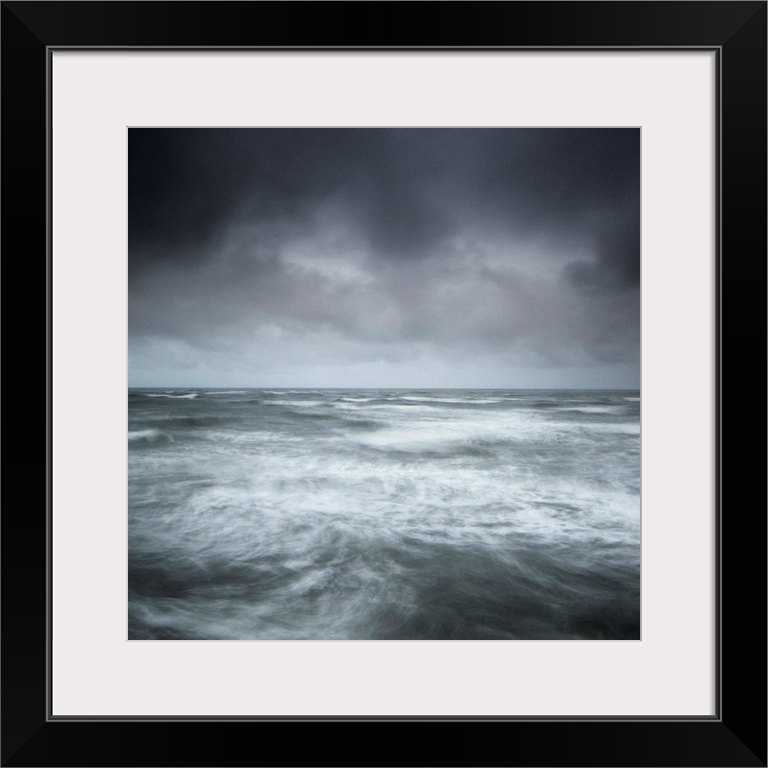 A stormy seascape, minimalist with swirling waves and a stormy sky in greys, greens, blues and silvers.