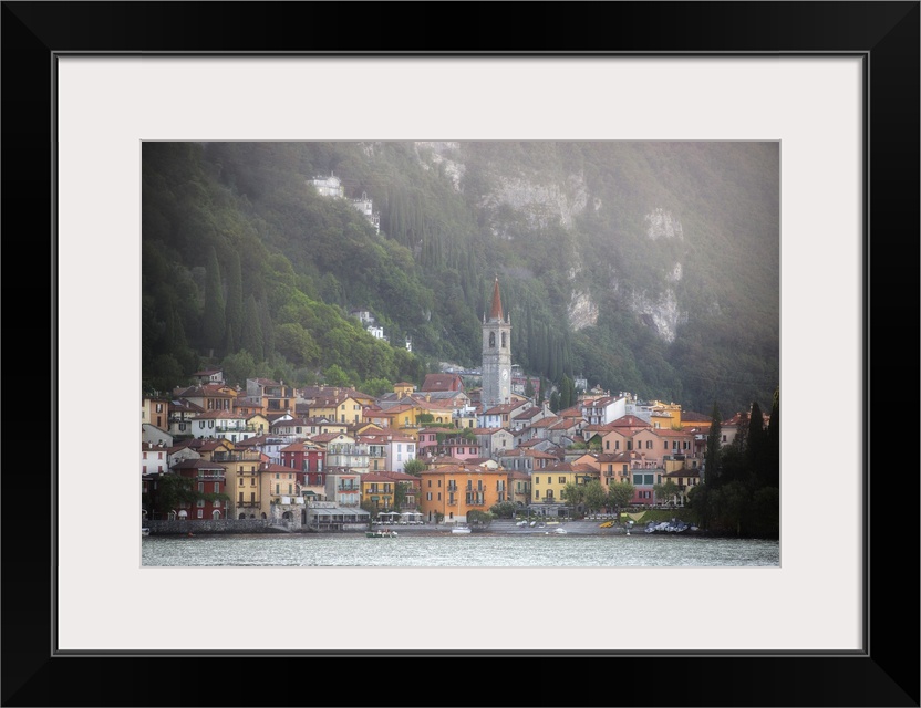 The city of Varenna in Italy at the bottom of the Alps on the coast.
