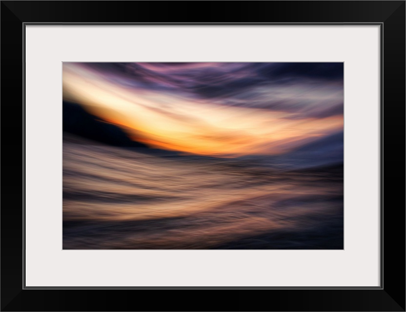 Abstract image of Slocan lake in British Columbia, Canada, giving an impression of a sunset on the lake. The image was mad...