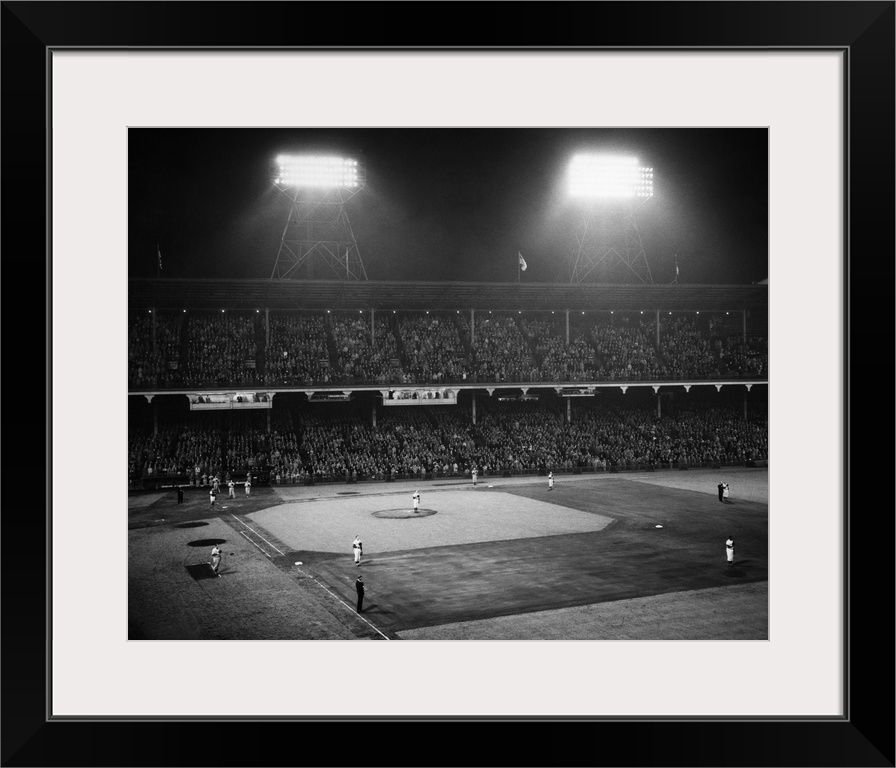 1940's 1947 Baseball Night Game Under The Lights Players Standing For National Anthem Ebbets Field Brooklyn New York USA.