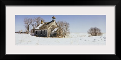 Abandoned schoolhouse on a snow-covered landscape, Friberg Township, Minnesota