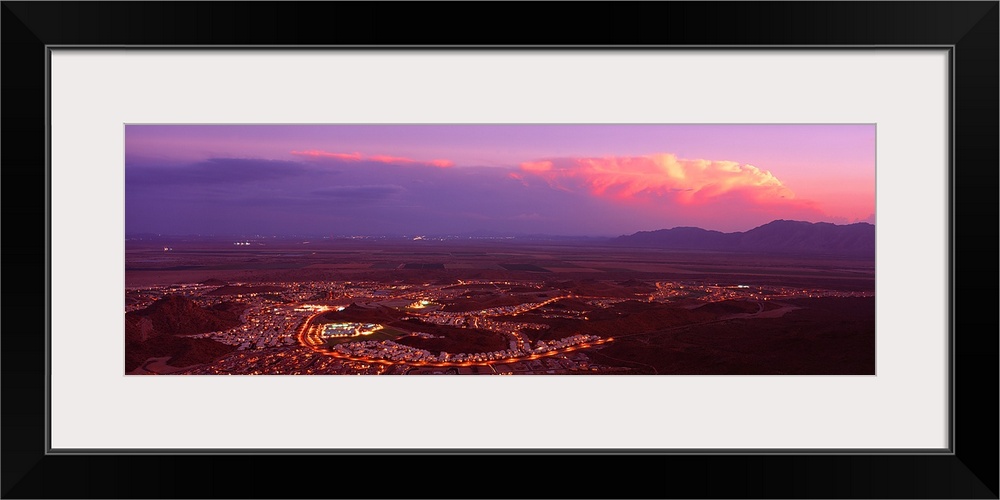 Aerial view of a city lit up at sunset, Phoenix, Maricopa County, Arizona,