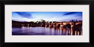 Arch bridge across a river with a cathedral in the background, St. Vitus Cathedral, Hradcany Castle, Vltava river, Prague, Czech Republic
