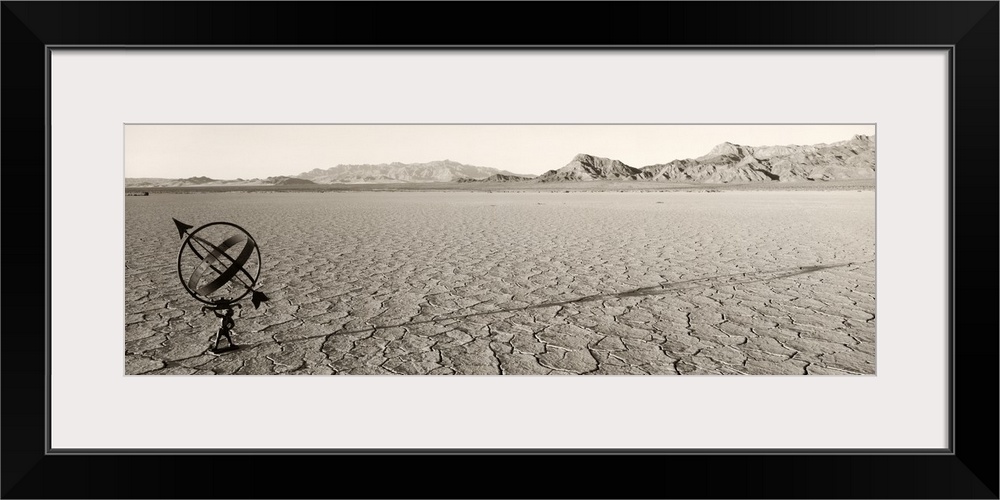 Armillary sphere on dry lake bed, Mojave Desert, California