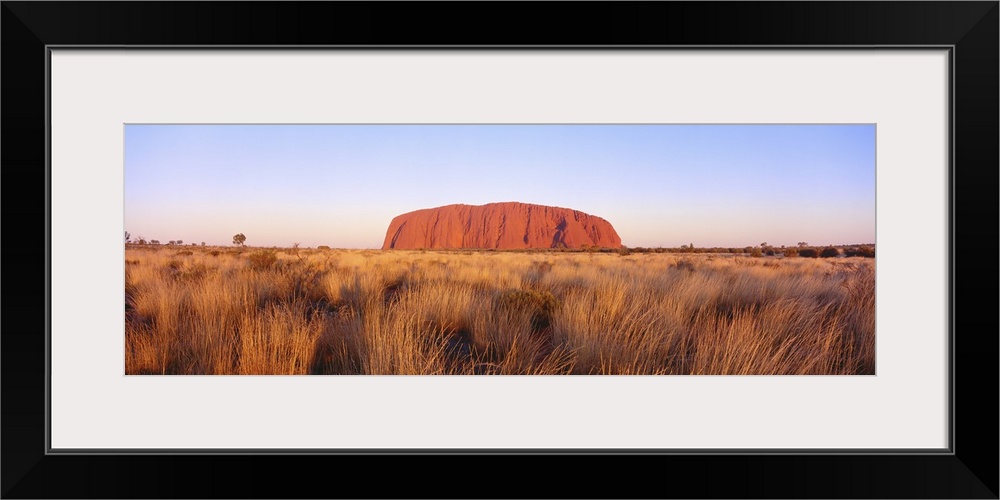 Panoramic image of a famous geological formation in Australia.