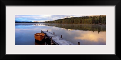 Boat moored at a pier, Hector Lake, Mt John Laurie, Rocky Mountains, Kananaskis Country, Calgary, Alberta, Canada