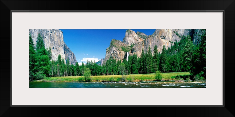 Wall art for the home or office a panoramic landscape photograph of a river and meadow in the Yosemite Valley in the summer.